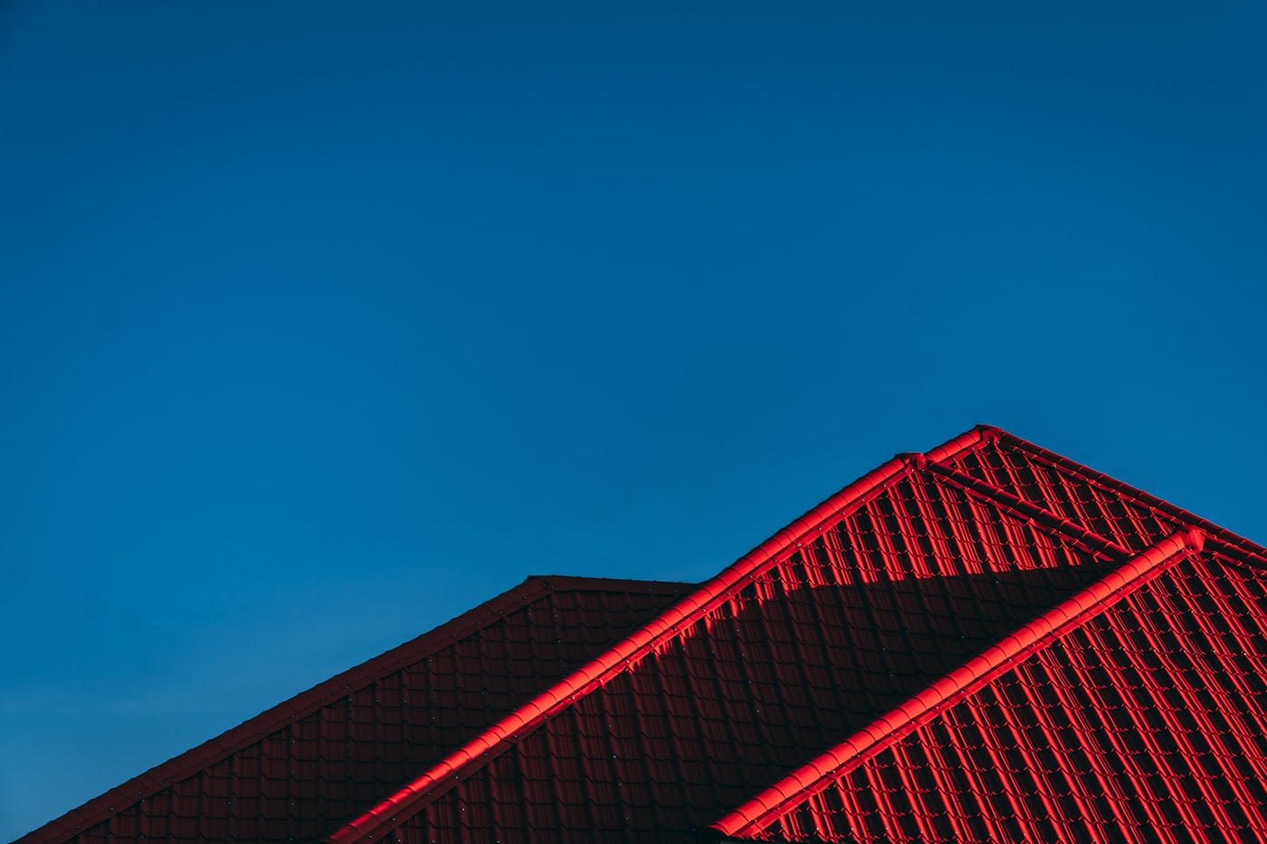 Roofline against an evening sky